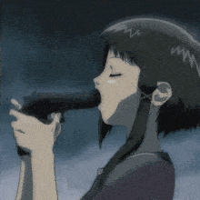 a girl is holding a gun in her mouth with a slight smirk on her face