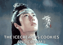 a man with a crown on his head looks up at the sky with the words the icecream is cookies and cream