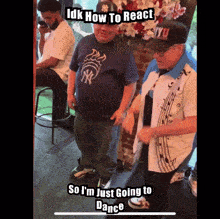a man wearing a ny yankees shirt is dancing with another man