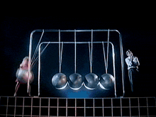 Man-falling Large-steel-balls GIF