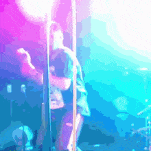 a man stands in front of a microphone in a blurry photo