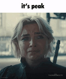 a woman is crying with the words it 's peak on top
