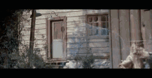 a house with a white door and a window