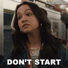 a woman says do n't start in front of a karate kid movie logo