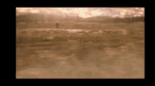 a painting of a desert landscape with mountains in the background .