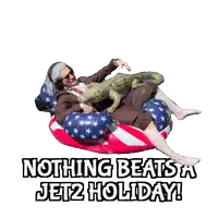 a man is laying on an american flag float with the words " nothing beats a jet2 holiday "