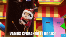 a cartoon character with a cane and the words vamos cerrando el hocico below him