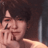 a close up of a man holding a pencil to his face