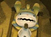 a cartoon character with a crown on his head is holding a cigar