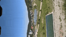 a swimming pool in the middle of a field