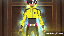 a boy in a yellow jacket with a blue x on it