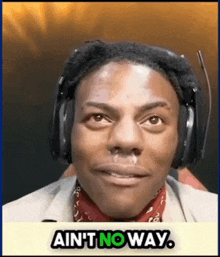 a man wearing headphones and a bandana says " ain 't no way "