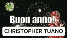 a fireworks display with the words buon anno christopher tuano
