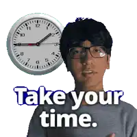 a man wearing glasses stands in front of a clock that says " take your time "