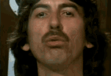 George Harrison Smoking GIF - George Harrison Smoking Blowing GIFs