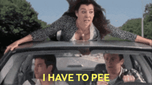 a woman sitting on top of a car with the words i have to pee written below her