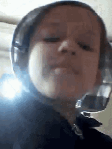 a close up of a person wearing headphones