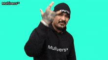 a man wearing a black hoodie that says " multivers " on it