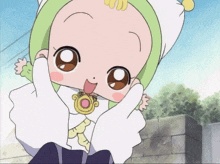 a little girl with a green hat and white gloves is making a funny face
