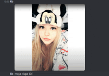 a picture of a girl wearing a mickey mouse hat with 13:33 kb written below it
