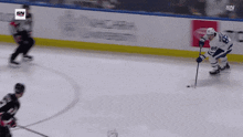 a hockey player with the number 89 on his jersey is standing on the ice