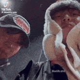 a tiktok video of two people with the name bluelife.one