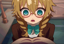a girl with glasses and a blue bow tie