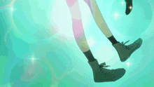 a person 's feet are shown in a cartoon with green shoes