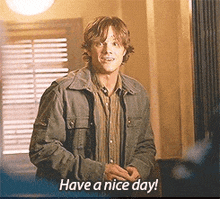 a man says have a nice day in a room