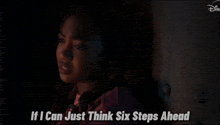 a girl in a dark room with the words if i can just think six steps ahead above her