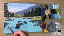 a painting of a river and trees is being painted by a person