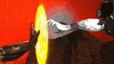 a person 's hand is reaching out towards a glowing object
