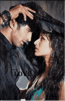 a man and a woman are standing in the rain and the word love is on the bottom right