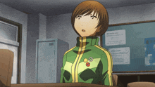 a girl wearing a green and yellow jacket has a smiley face pin on her jacket