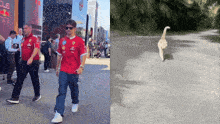 a man in a red ferrari shirt is walking down a street
