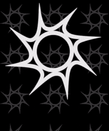 a black background with a white sun in the center