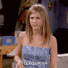 a woman in a blue paisley dress says " to your 64 "