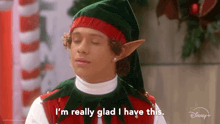 a young boy dressed as an elf says i 'm really glad i have this