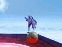 a pixelated image of a person standing on a red ball