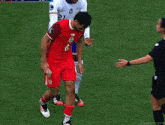 a soccer player with the number 6 on his shirt