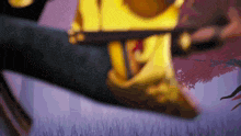a blurry picture of a person holding a gold object