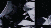 a blurry picture of a person 's face with a black background