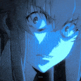 a close up of a person 's face with a blue light behind them