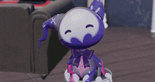 a purple and white cartoon character with a bow on its head
