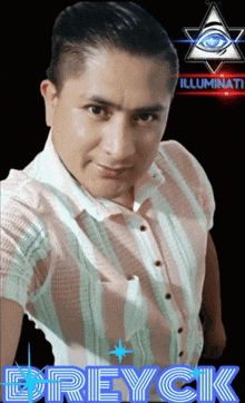 a man in a pink and white striped shirt with the name edreycik