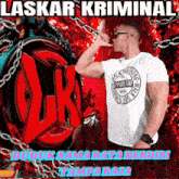 a man wearing a white shirt that says gymbeam on it talks on a cell phone