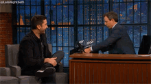Wine For Schwimmer GIF - Seth Meyers Late Night Seth Late Night With Seth Meyers GIFs