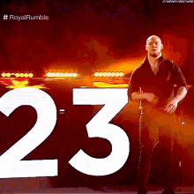 a man is standing in front of a sign that says 23