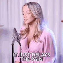 It Just Delays The Pain Emma Heesters GIF - It Just Delays The Pain Emma Heesters Maafkan Aku Song GIFs