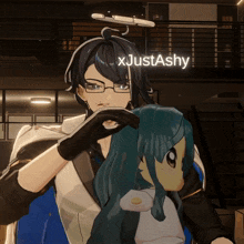 a man with glasses is holding a doll with the name xjustashy written on it